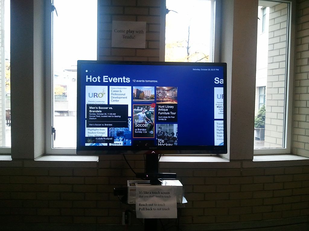 Teudu Metro-style tile layout showing event cards on a large display